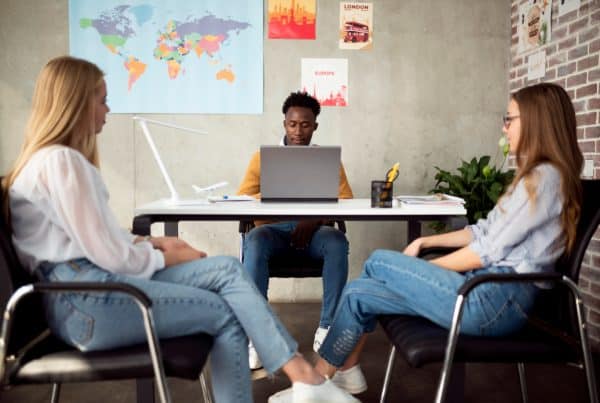 Medium Shot People Travel Agency 600x403