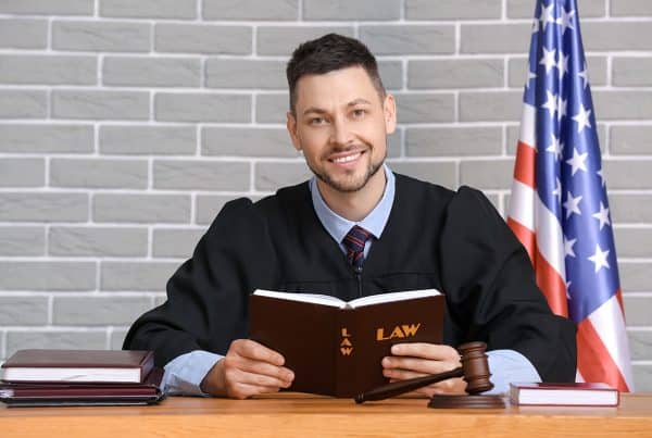 Male Judge With Book Table Courtroom