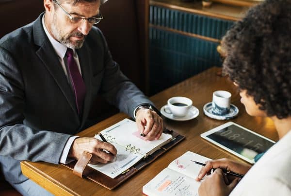 Business People Discussing Cafe